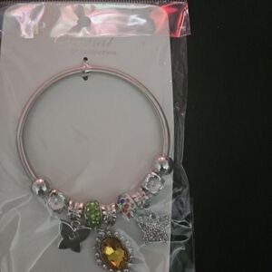 Elegant Silver Bracelet with Green and Yellow Accents